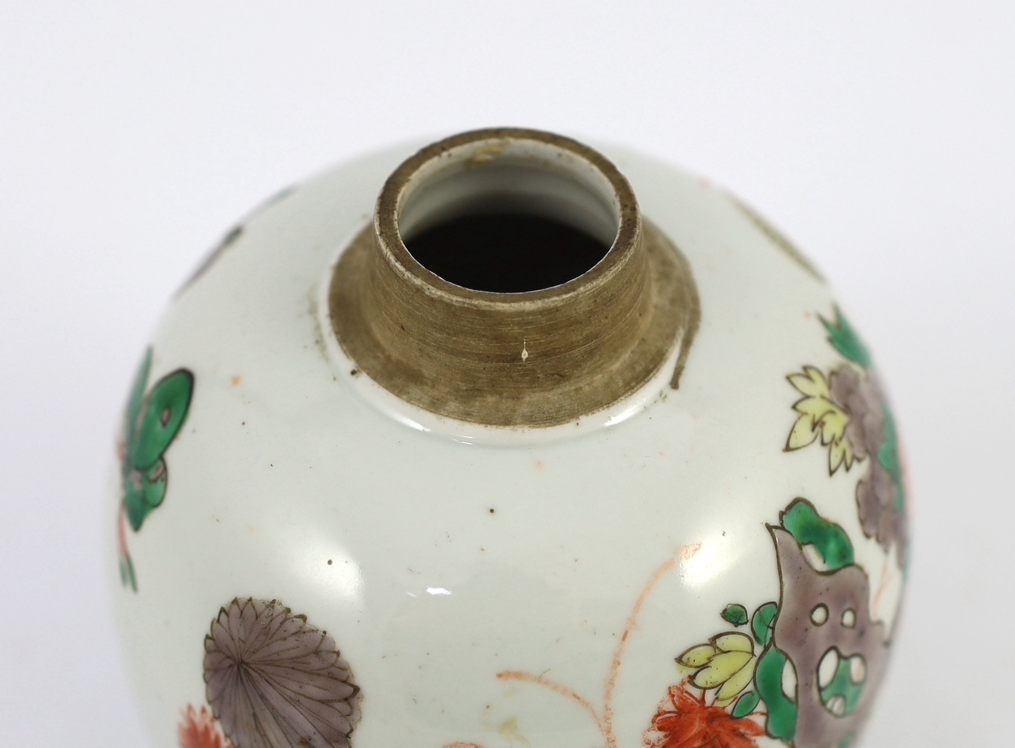 A Chinese famille verte small ovoid jar, Kangxi period, some wear to the iron red enamel